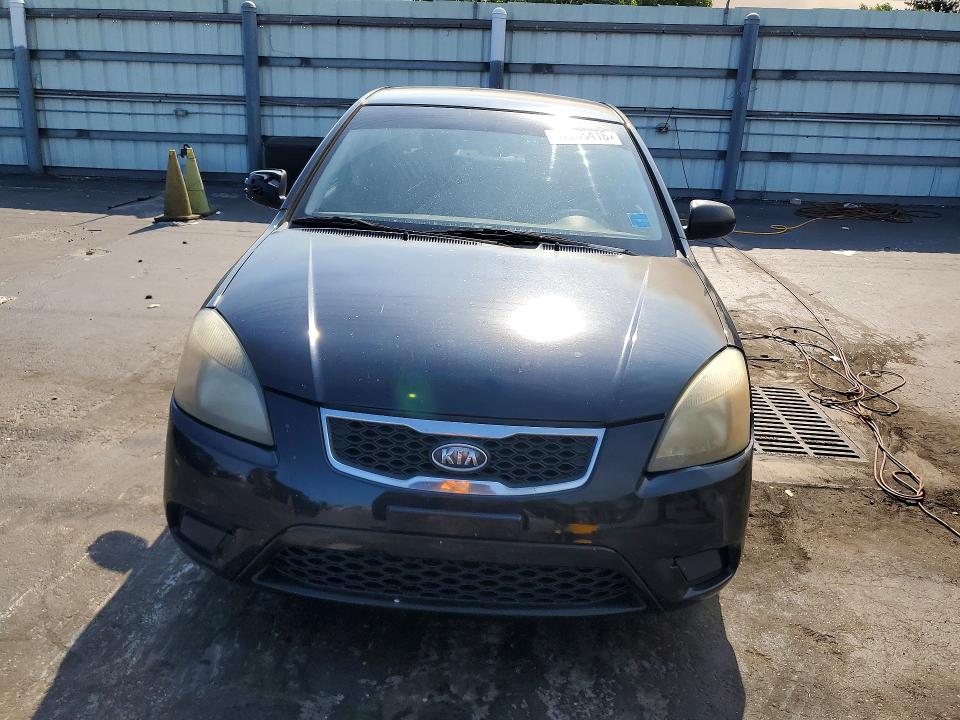 2010 Kia Rio VIN KNADH4A38A6635781 COPART salvage auction — SIDE, Fl - Cert Of Title Slvg Rebuildable, sold $425 on 2026-07-11 (photo 5)
