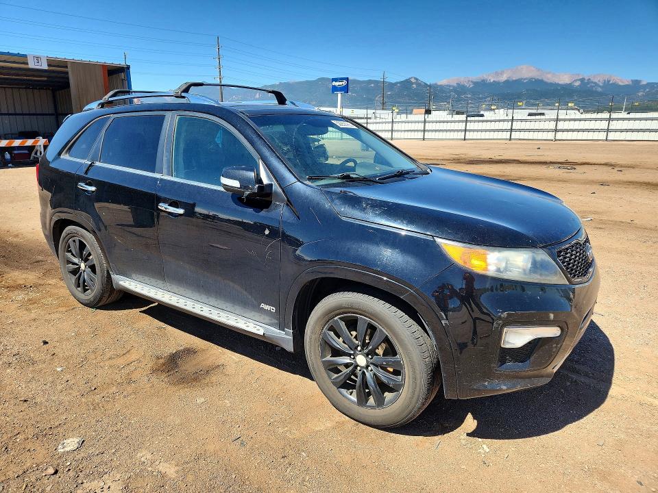 2012 Kia Sorento VIN 5XYKWDA23CG308986 COPART salvage auction — HAIL, Co - Dis/Dlr/Exp Only Clean Title, sold $1,300 on 2026-07-27 (photo 4)