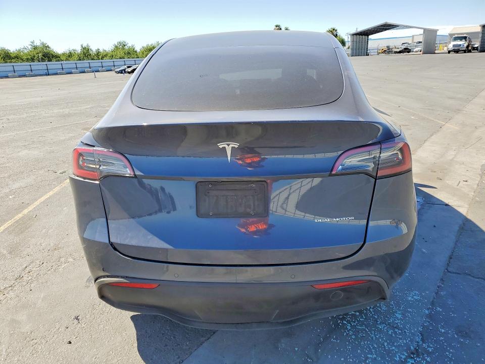 2022 Tesla Model y VIN 7SAYGDEE4NF386461 COPART salvage auction — REAR END, Ca - Salvage Certificate, sold $7,800 on 2026-08-27 (photo 6)