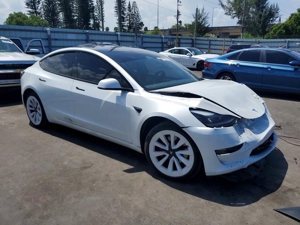 2023 Tesla Model 3 VIN 5YJ3E1EA3PF670241 COPART salvage auction — FRONT END, FL - CERTIFICATE OF DESTRUCTION, sold $8,600 on 2026-07-27 (photo 4)