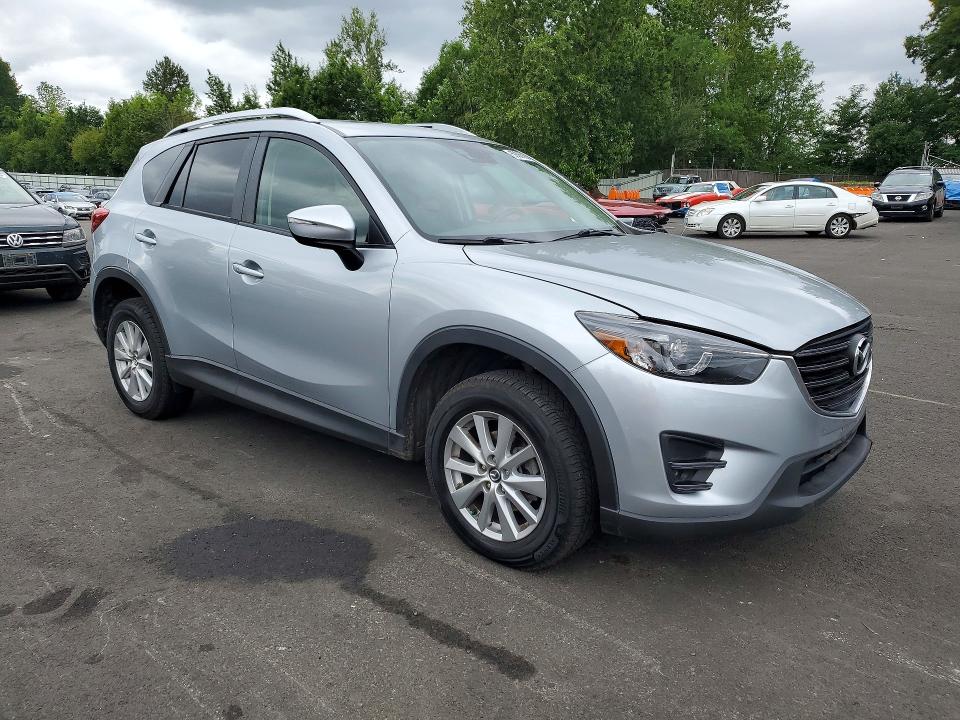 2016 Mazda Cx-5 VIN JM3KE4CY9G0660669 COPART salvage auction — MECHANICAL, Or - Non Public Clean Title, sold $4,700 on 2026-07-06 (photo 4)