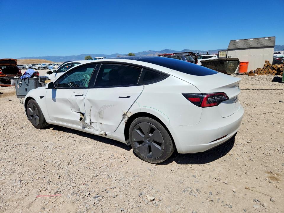 2021 Tesla Model 3 VIN 5YJ3E1EB8MF928242 COPART salvage auction — SIDE, UT - SALVAGE CERTIFICATE, sold $7,600 on 2026-07-31 (photo 2)