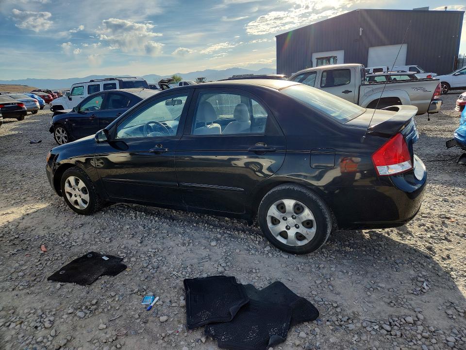 2009 Kia Spectra VIN KNAFE222395593193 COPART salvage auction — SIDE, Ut - Salvage Certificate, sold $700 on 2026-07-10 (photo 2)
