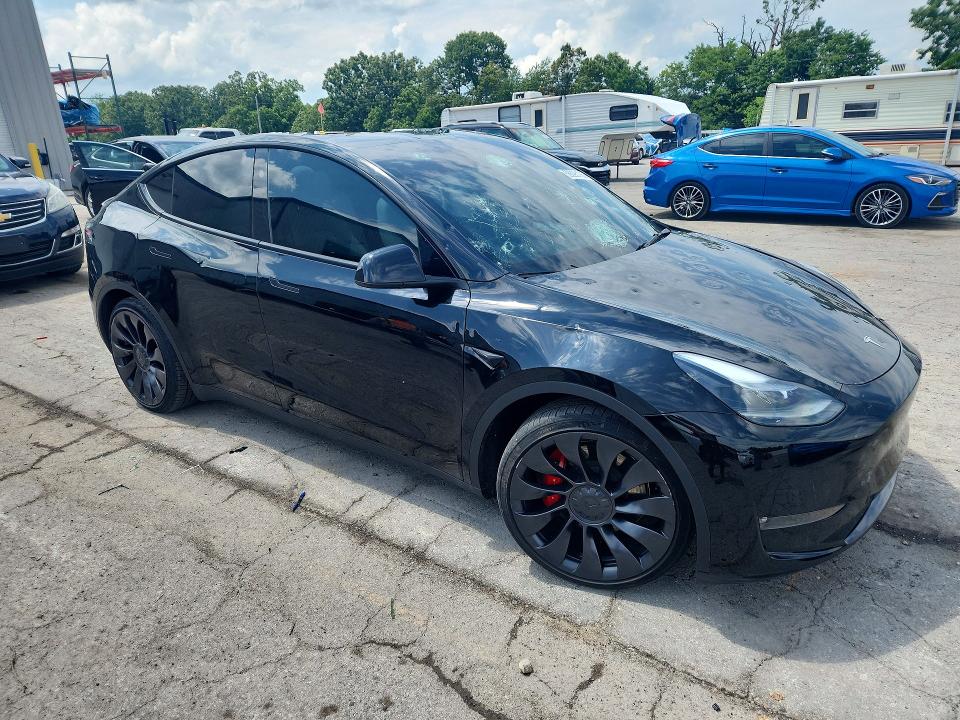 2023 Tesla Model y VIN 7SAYGDEF7PF892359 COPART salvage auction — HAIL, Mo - Salvage Certificate Of Title, sold $12,600 on 2026-07-29 (photo 4)