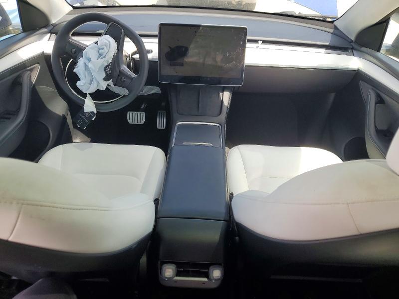 2023 Tesla Model y VIN 7SAYGDEF2PF749870 COPART salvage auction — FRONT END, TX - SALVAGE VEHICLE TITLE, sold $9,500 on 2026-07-20 (photo 8)