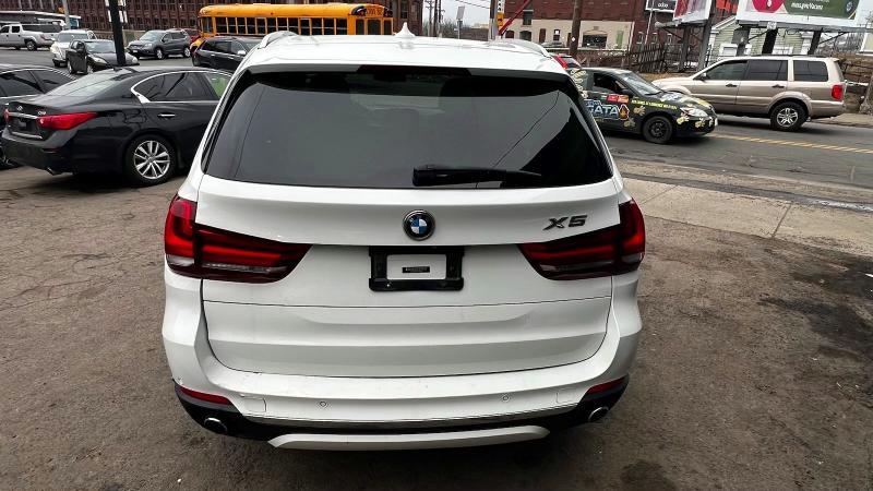 2015 BMW X5 VIN 5UXKR0C50F0P16040 COPART salvage auction — NORMAL WEAR, Ma - Certificate Of Title (P), sold $2,900 on 2026-07-29 (photo 4)