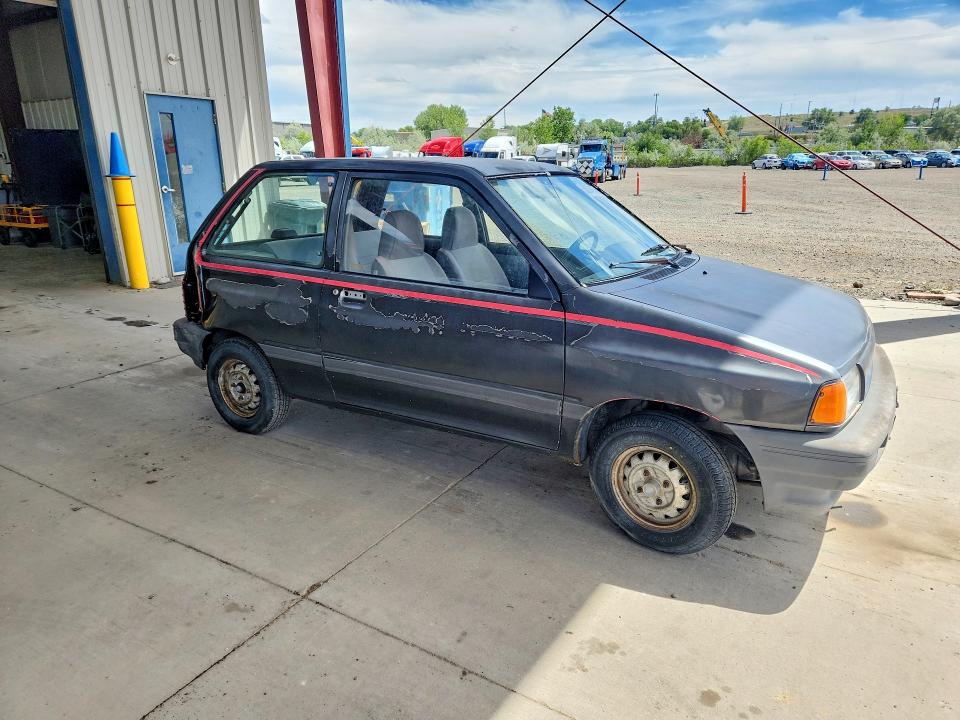 1988 Ford Festiva VIN KNJBT06K8J6197083 COPART salvage auction — REAR END, Mt - Certificate Of Title, sold $400 on 2026-07-06 (photo 4)