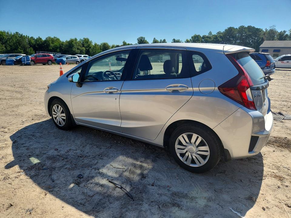 2016 Honda Fit VIN JHMGK5H55GX036739 COPART salvage auction — SIDE, Fl - Cert Of Title Slvg Rebuildable, sold $2,900 on 2026-07-10 (photo 2)