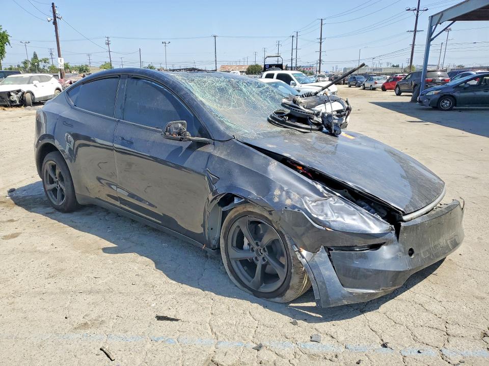 2026 Tesla Model y VIN 7SAYGDEE2TF574957 COPART salvage auction — ALL OVER, CA - SALVAGE CERTIFICATE, sold $12,200 on 2026-07-16 (photo 4)