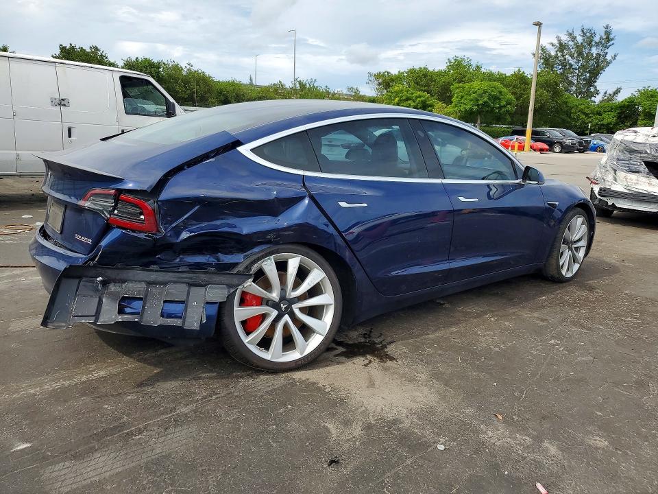 2019 Tesla Model 3 VIN 5YJ3E1EB8KF237774 COPART salvage auction — REAR END, Fl - Cert Of Title Slvg Rebuildable, sold $5,500 on 2026-07-08 (photo 3)