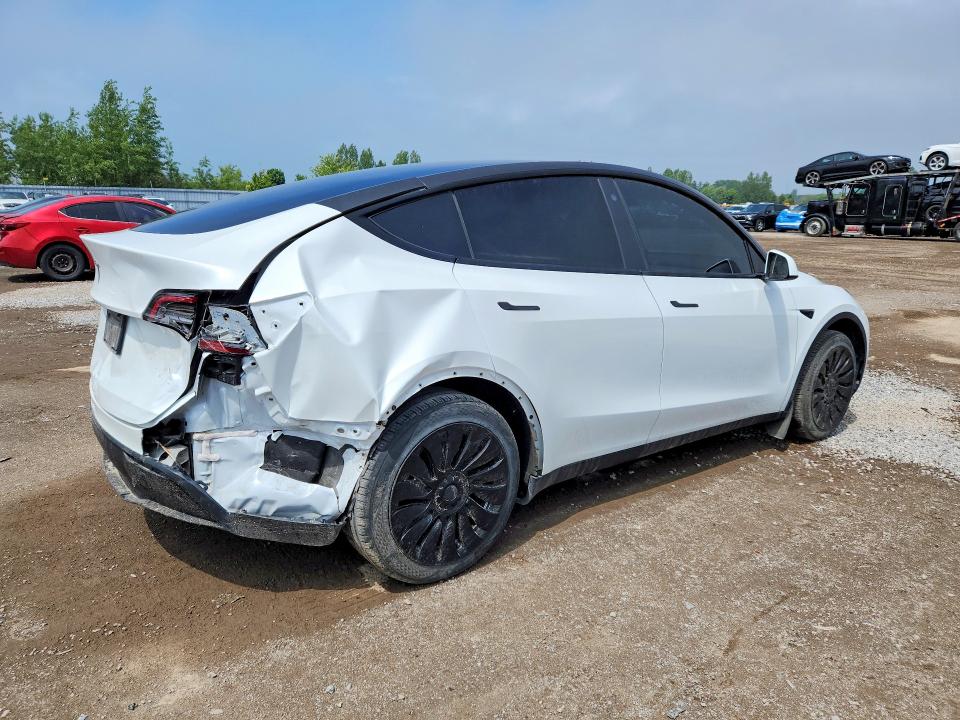 2023 Tesla Model y VIN LRWYGDFDXPC901706 COPART salvage auction — REAR END, On - Permit Salvage, sold $6,600 on 2026-07-28 (photo 3)