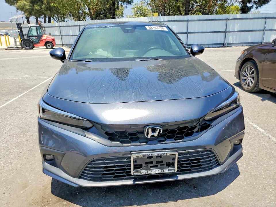 2023 Honda Civic VIN 19XFL1H88PE000296 COPART salvage auction — INTERIOR BURN, Ca - Salvage Certificate, sold $6,400 on 2026-07-02 (photo 5)