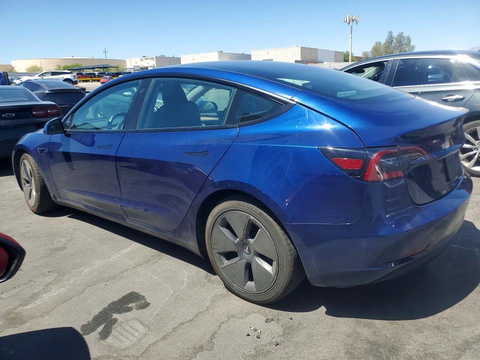 2023 Tesla Model 3 VIN 5YJ3E1EA9PF677632 COPART salvage auction — SIDE, Nv - Salvage Title, sold $8,200 on 2026-07-15 (photo 2)