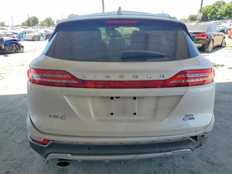 2015 Lincoln Mkz VIN 5LMCJ1A90FUJ15866 COPART salvage auction — ROLLOVER, Ca - Salvage Certificate, sold $425 on 2026-07-02 (photo 6)