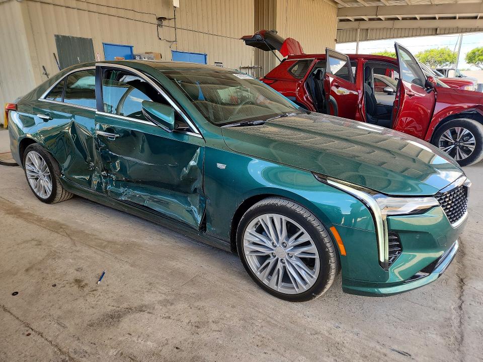 2025 Cadillac Ct4 VIN 1G6DB5RK9S0102383 COPART salvage auction — SIDE, Fl - Cert Of Title Slvg Rebuildable, sold $14,400 on 2026-08-05 (photo 4)