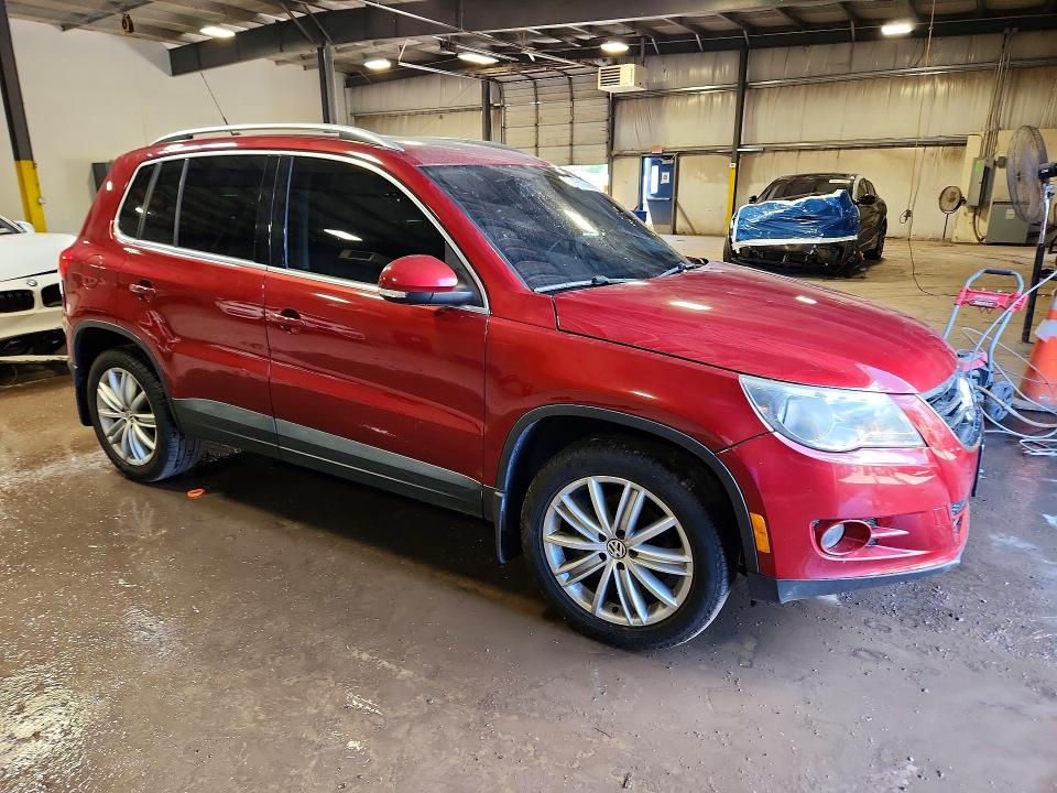 2011 Volkswagen Tiguan VIN WVGBV7AX7BW001009 COPART salvage auction — VANDALISM, Pa - Cert Of Salvage-Theft, sold $15 on 2026-08-03 (photo 4)
