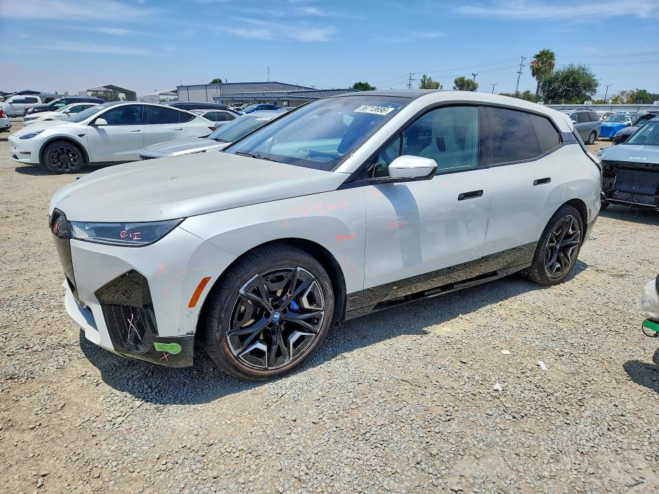 2023 BMW Ix VIN WB523CF00PCM58408 COPART salvage auction — SIDE, Ca - Salvage Certificate, sold $4,000 on 2026-07-21 (photo 1)