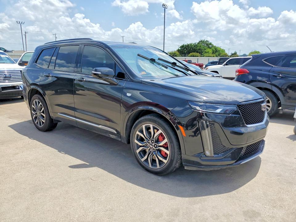 2023 Cadillac Xt6 VIN 1GYKPGRS0PZ141748 COPART salvage auction — WATER/FLOOD, Salvage Title, sold $9,000 on 2026-07-30 (photo 4)