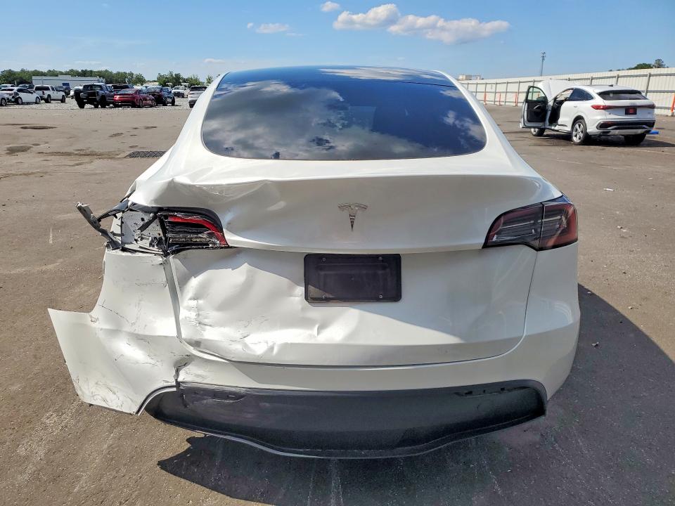 2024 Tesla Model y VIN 7SAYGDED8RA323132 COPART salvage auction — REAR END, Fl - Cert Of Title Slvg Rebuildable, sold $13,400 on 2026-07-20 (photo 6)