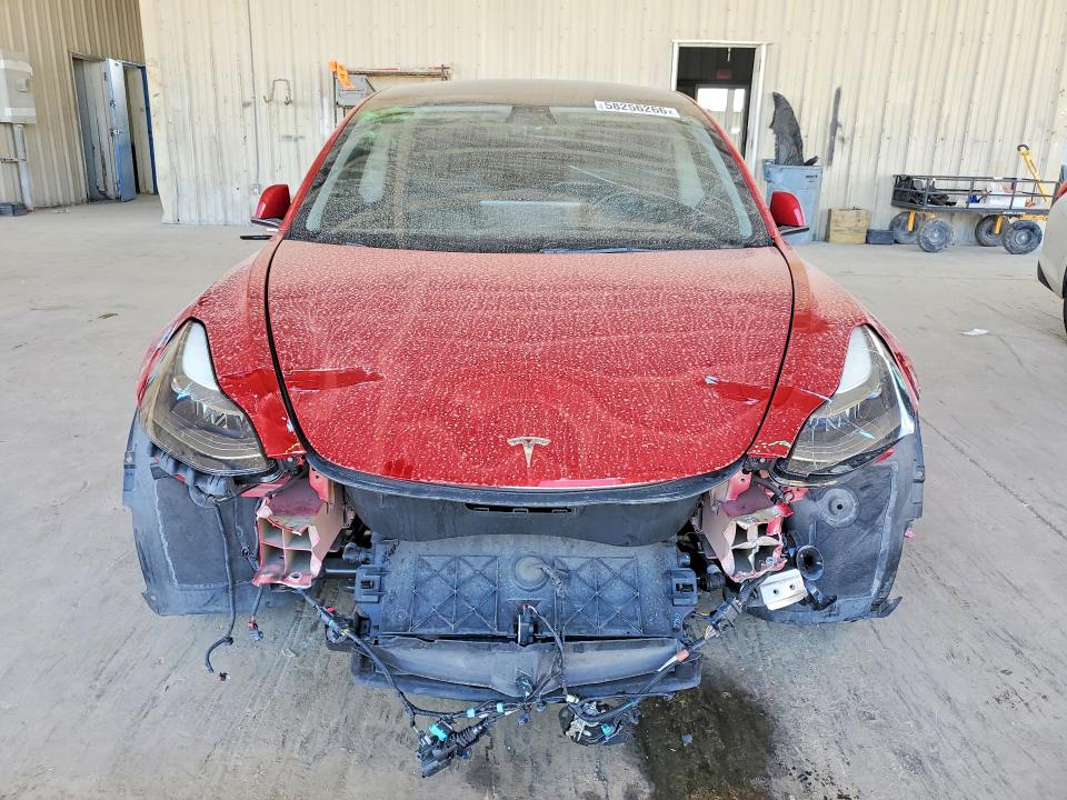 2021 Tesla Model 3 VIN 5YJ3E1EAXMF097060 COPART salvage auction — FRONT END, Fl - Cert Of Title Slvg Rebuildable, sold $5,800 on 2026-07-08 (photo 5)