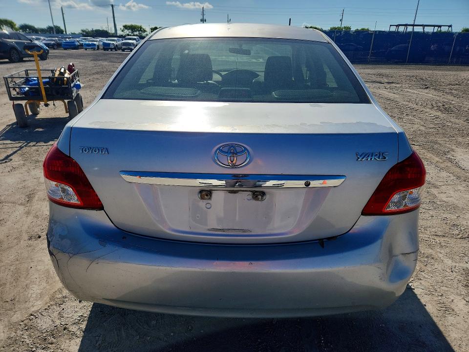2011 Toyota Yaris VIN JTDBT4K37B1405476 COPART salvage auction — REAR END, Fl - Certificate Of Title, sold $1,500 on 2026-07-08 (photo 6)