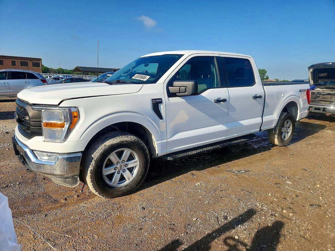 2021 Ford F-150 Lightning VIN 1FTFW1E88MFC73123 COPART salvage auction — Normal Wear, KS - CERTIFICATE OF TITLE, sold $8,000 on 2026-07-09 (photo 1)