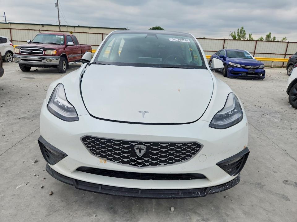 2022 Tesla VIN 7SAYGDEE9NF434469 COPART salvage auction — SIDE, Tx - Salvage Vehicle Title, sold $7,800 on 2026-07-07 (photo 5)