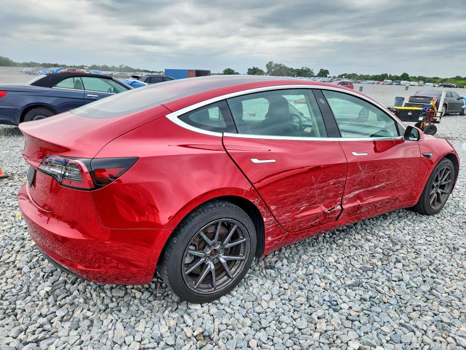 2019 Tesla Model 3 VIN 5YJ3E1EA9KF308357 COPART salvage auction — SIDE, Fl - Cert Of Title Slvg Rebuildable, sold $6,600 on 2026-07-07 (photo 3)