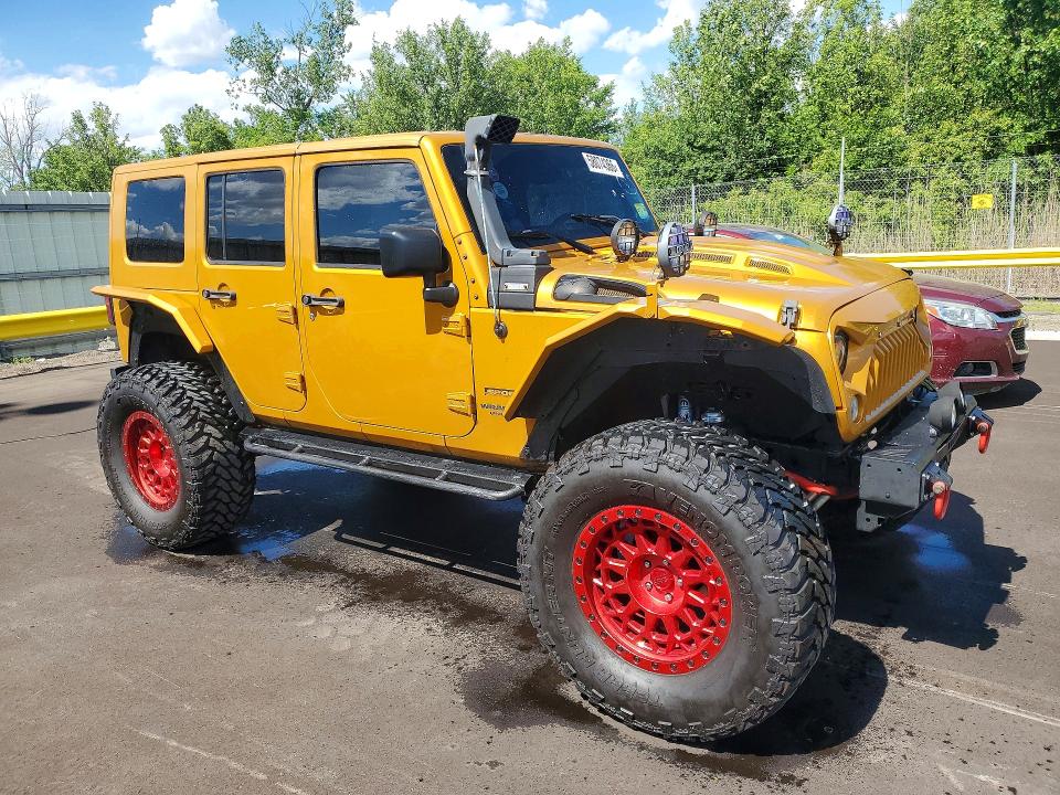2014 Jeep Wrangler unlimited VIN 1C4BJWDG1EL276774 COPART salvage auction — MINOR DENT/SCRATCHES, Mi - Cert Of Title-Rebuilt Salvage, sold $6,800 on 2026-07-02 (photo 4)