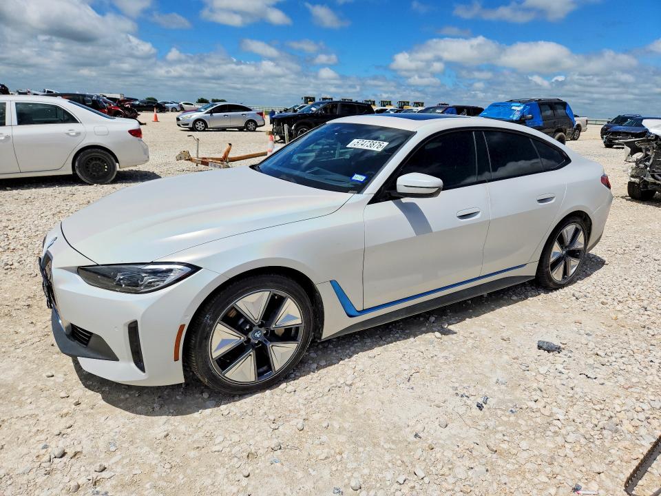 2023 BMW VIN WBY73AW02PFP85873 COPART salvage auction — SIDE, TX - SALVAGE VEHICLE TITLE (P), sold $12,100 on 2026-07-23 (photo 1)