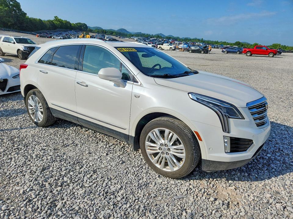 2017 Cadillac Xt5 VIN 1GYKNERS9HZ215101 COPART salvage auction — NORMAL WEAR, Tn - Certificate Of Title, sold $11,200 on 2026-07-02 (photo 4)