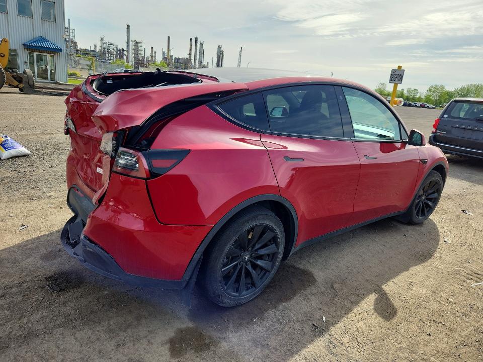 2023 Tesla Model y VIN LRWYGDFDXPC966569 COPART salvage auction — REAR END, Qc - Gravement Accidente, sold $7,600 on 2026-07-07 (photo 3)