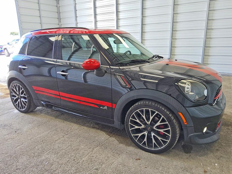 2016 Mini Cooper VIN WMWXD1C52GWT97635 COPART salvage auction — MINOR DENT/SCRATCHES, FL - CERTIFICATE OF TITLE, sold $3,100 on 2026-07-09 (photo 4)