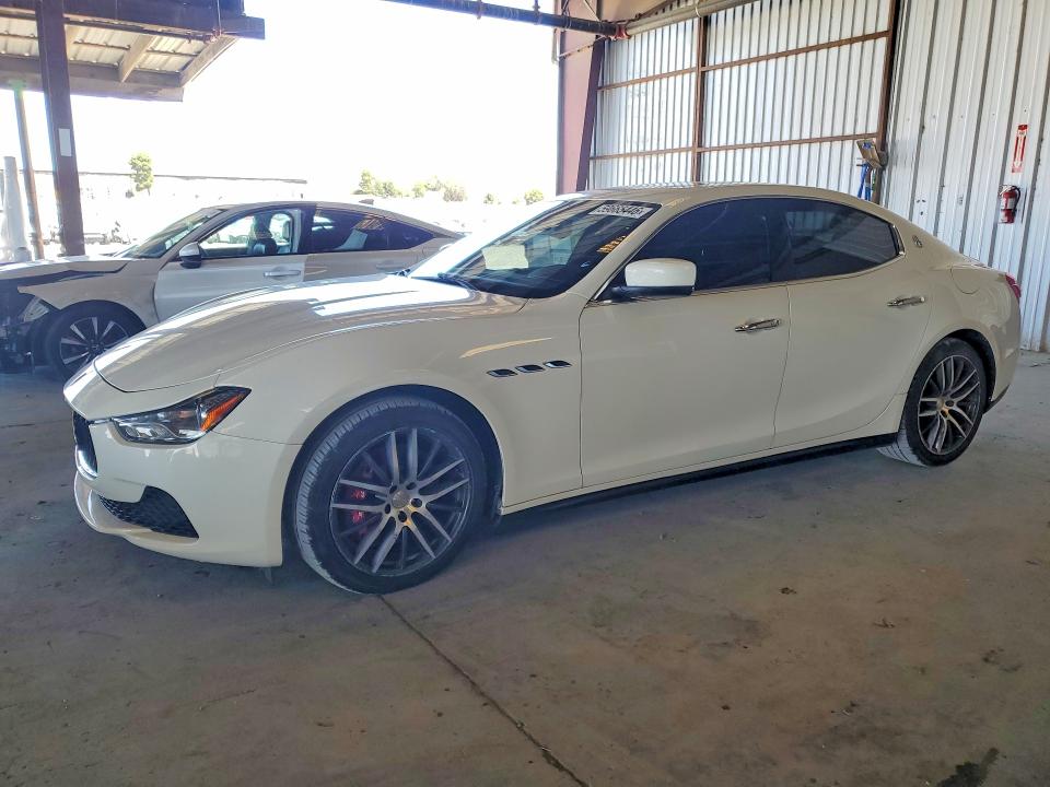 2015 Maserati Ghibli VIN ZAM57XSA4F1131589 COPART salvage auction — MINOR DENT/SCRATCHES, Ca - Certificate Of Title, sold $3,950 on 2026-07-08 (photo 1)