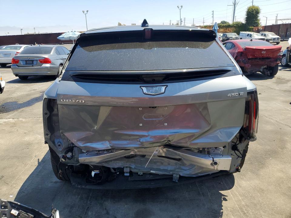2026 Cadillac Optiq VIN 3GYK3GM50TS116899 COPART salvage auction — REAR END, Ca - Salvage Certificate, sold $9,000 on 2026-07-15 (photo 6)