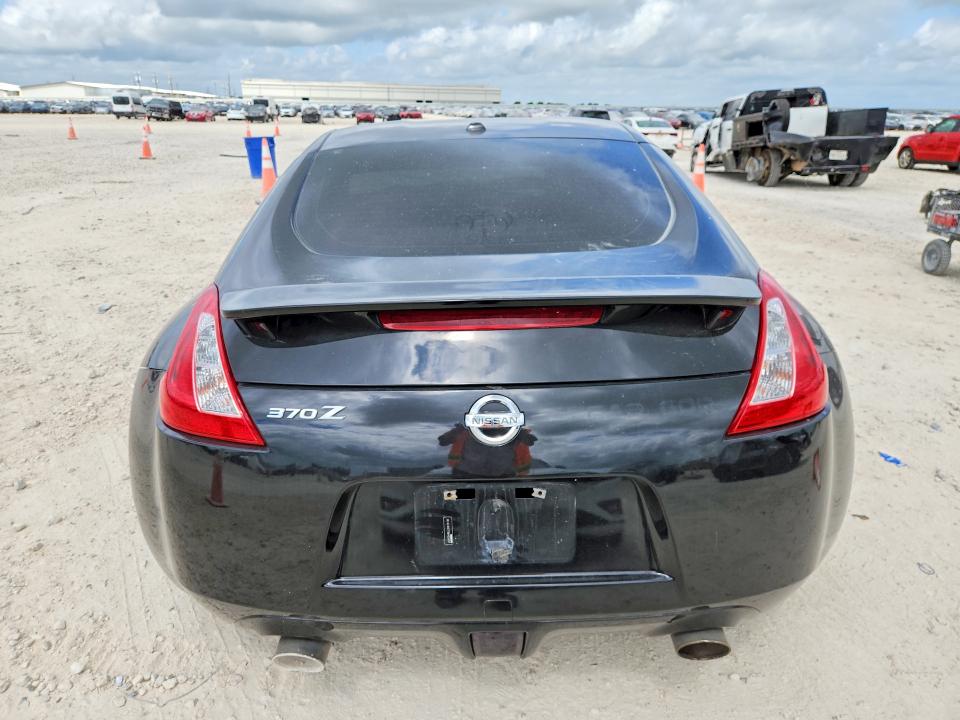 2009 Nissan 370z VIN JN1AZ44E79M405997 COPART salvage auction — SIDE, Tx - Salvage Vehicle Title, sold $2,200 on 2026-07-16 (photo 6)