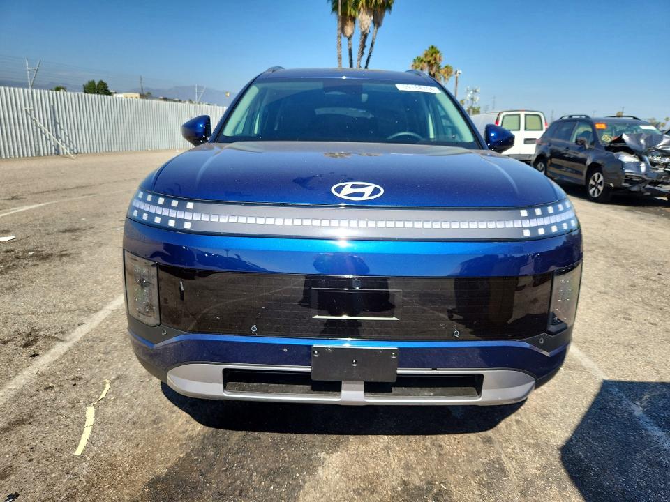 2026 Hyundai Ioniq 9 VIN 7YAMS5S16TY008343 COPART salvage auction — NORMAL WEAR, Ca - Dis/Dlr/Exp Only Clean Title, sold $32,750 on 2026-07-17 (photo 5)