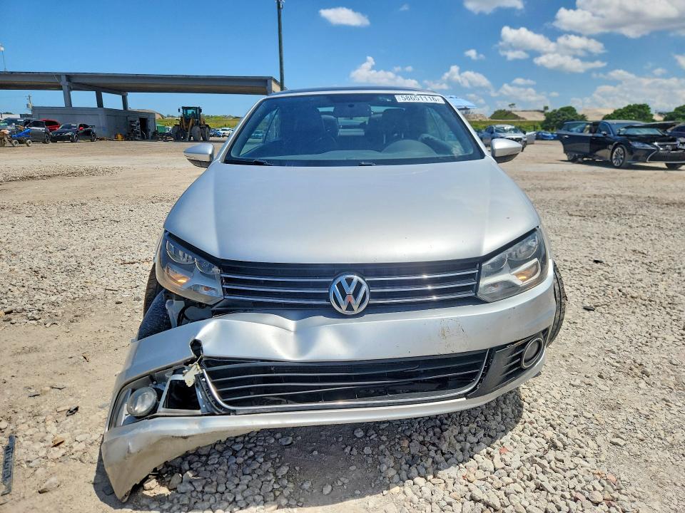 2015 Volkswagen Eos VIN WVWBW8AH4FV000038 COPART salvage auction — FRONT END, Fl - Cert Of Title Slvg Rebuildable, sold $1,300 on 2026-07-14 (photo 5)