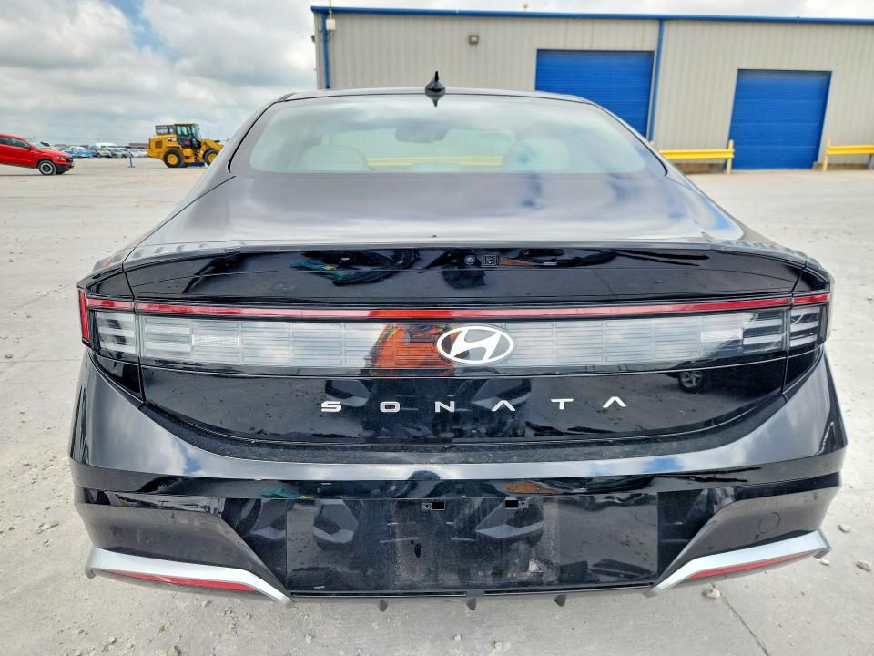 2026 Hyundai Sonata VIN KMHL64JA0TA554997 COPART salvage auction — FRONT END, TX - SALVAGE VEHICLE TITLE, sold $4,300 on 2026-07-28 (photo 6)
