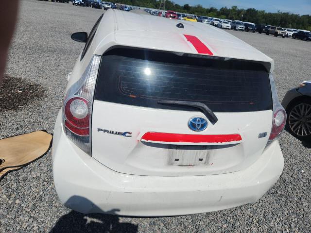 2014 Toyota Prius c VIN JTDKDTB3XE1572717 COPART salvage auction — MINOR DENT/SCRATCHES, Fl - Certificate Of Title, sold $1,050 on 2026-07-07 (photo 6)