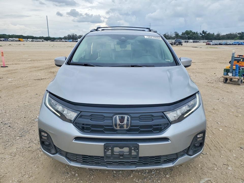 2026 Honda Odyssey VIN 5FNRL6H60TB026145 COPART salvage auction — SIDE, Tx - Salvage Vehicle Title, sold $14,400 on 2026-07-02 (photo 5)