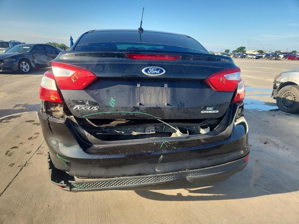 2014 Ford Focus VIN 1FADP3F29EL460518 COPART salvage auction — REAR END, Tx - Salvage Vehicle Title, sold $750 on 2026-07-02 (photo 6)