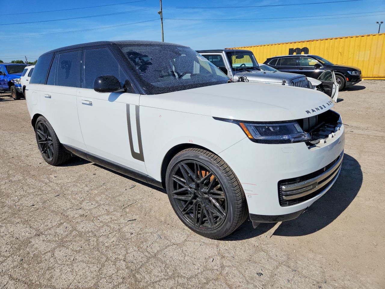 2023 Land Rover Range Rover VIN SALKP9FUXPA028453 COPART salvage auction — Side, IN - CERT OF TITLE-SALVAGE TITLE, sold $51,500 on 2026-07-07 (photo 4)