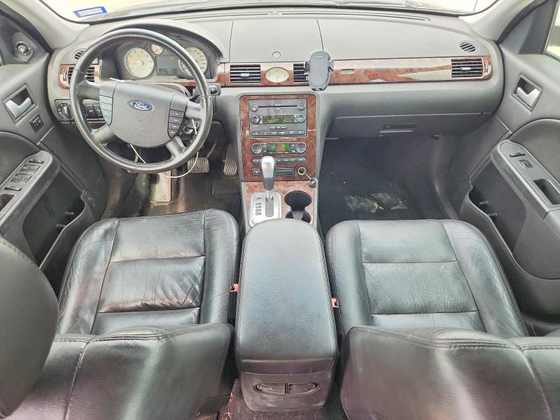 2006 Ford Five hundred VIN 1FAFP25136G105947 COPART salvage auction — SIDE, TX - SALVAGE VEHICLE TITLE (P), sold $250 on 2026-07-09 (photo 8)