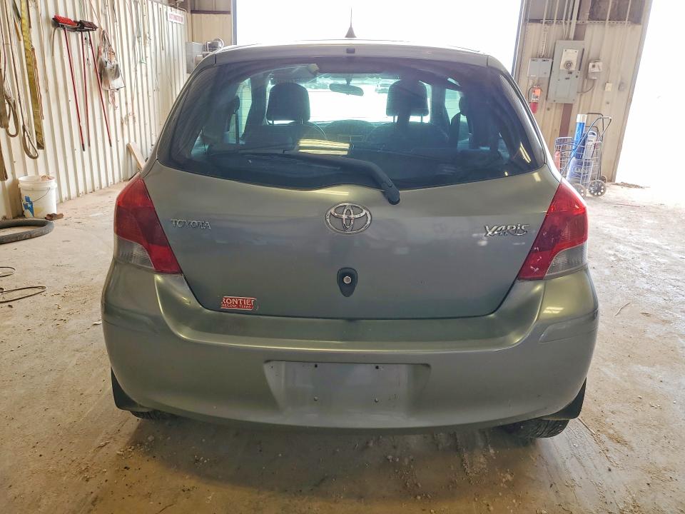 2010 Toyota Yaris VIN JTDJT4K37A5296164 COPART salvage auction — FRONT END, TX - SALVAGE VEHICLE TITLE, sold $650 on 2026-07-24 (photo 6)