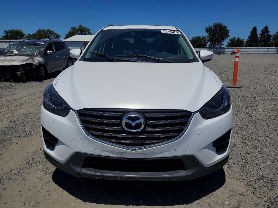 2016 Mazda Cx-5 VIN JM3KE4DY9G0851989 COPART salvage auction — SIDE, Ca - Salvage Certificate, sold $3,600 on 2026-07-14 (photo 5)