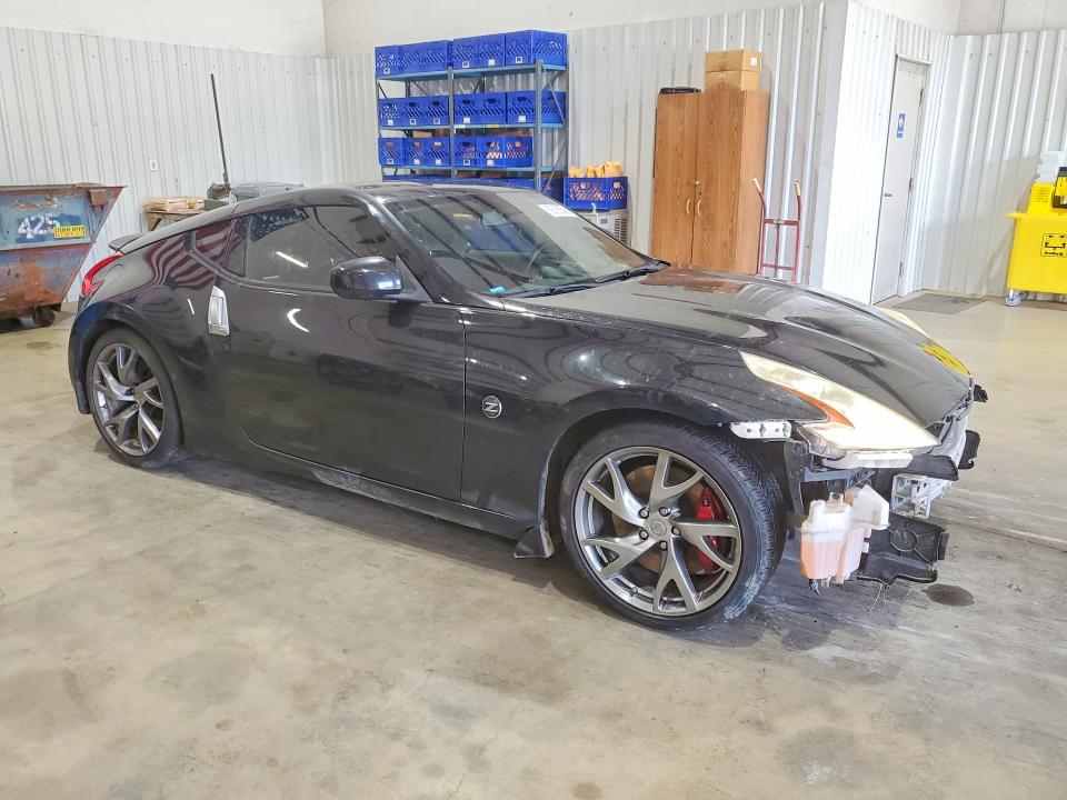 2015 Nissan VIN JN1AZ4EH3FM443067 COPART salvage auction — FRONT END, Tx - Salvage Vehicle Title, sold $3,200 on 2026-07-20 (photo 4)