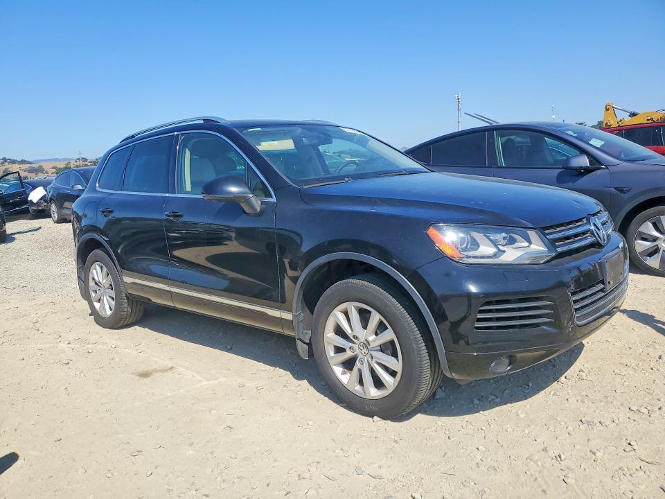 2013 Volkswagen Touareg VIN WVGEF9BP4DD013797 COPART salvage auction — MINOR DENT/SCRATCHES, Ca - Dis/Dlr/Exp App For Dup Clean, sold $2,950 on 2026-07-16 (photo 4)