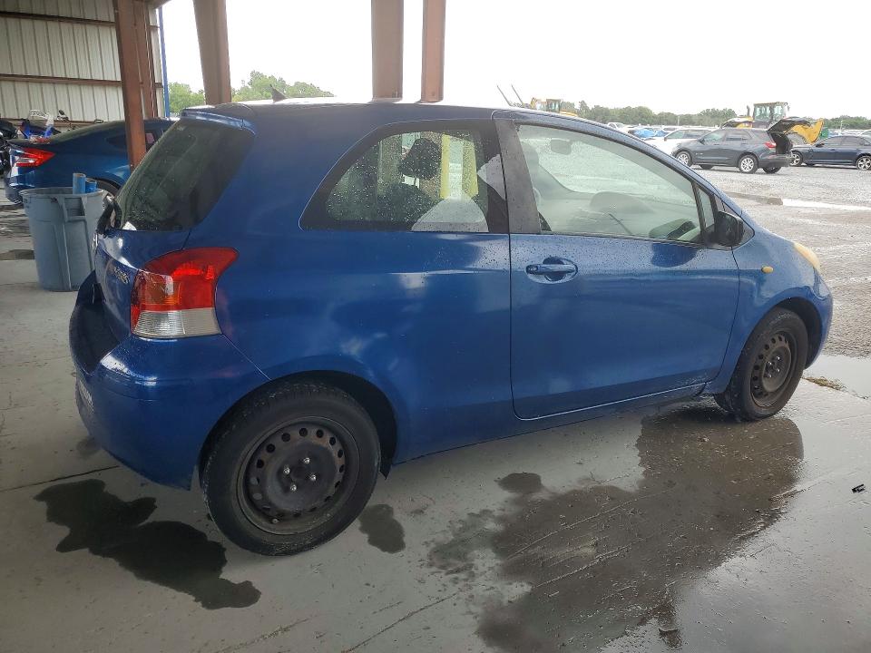 2010 Toyota Yaris VIN JTDJT4K33A5288689 COPART salvage auction — SIDE, Fl - Cert Of Title Slvg Rebuildable, sold $850 on 2026-07-06 (photo 3)