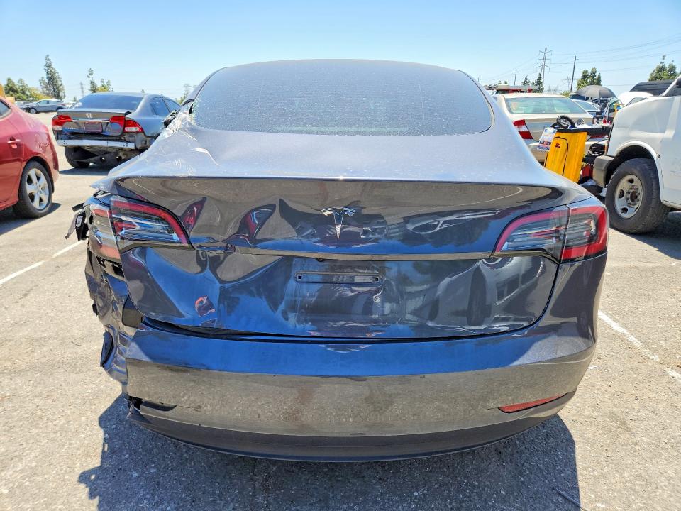 2023 Tesla Model 3 VIN 5YJ3E1EA8PF692056 COPART salvage auction — REAR END, Ca - Salvage Certificate, sold $7,700 on 2026-07-16 (photo 6)